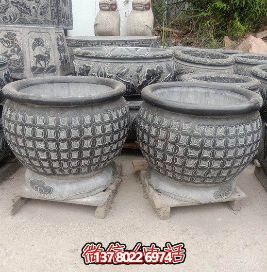 自然美學(xué)結(jié)合青石石雕、浮雕、編織、雕塑的戶外園林魚缸